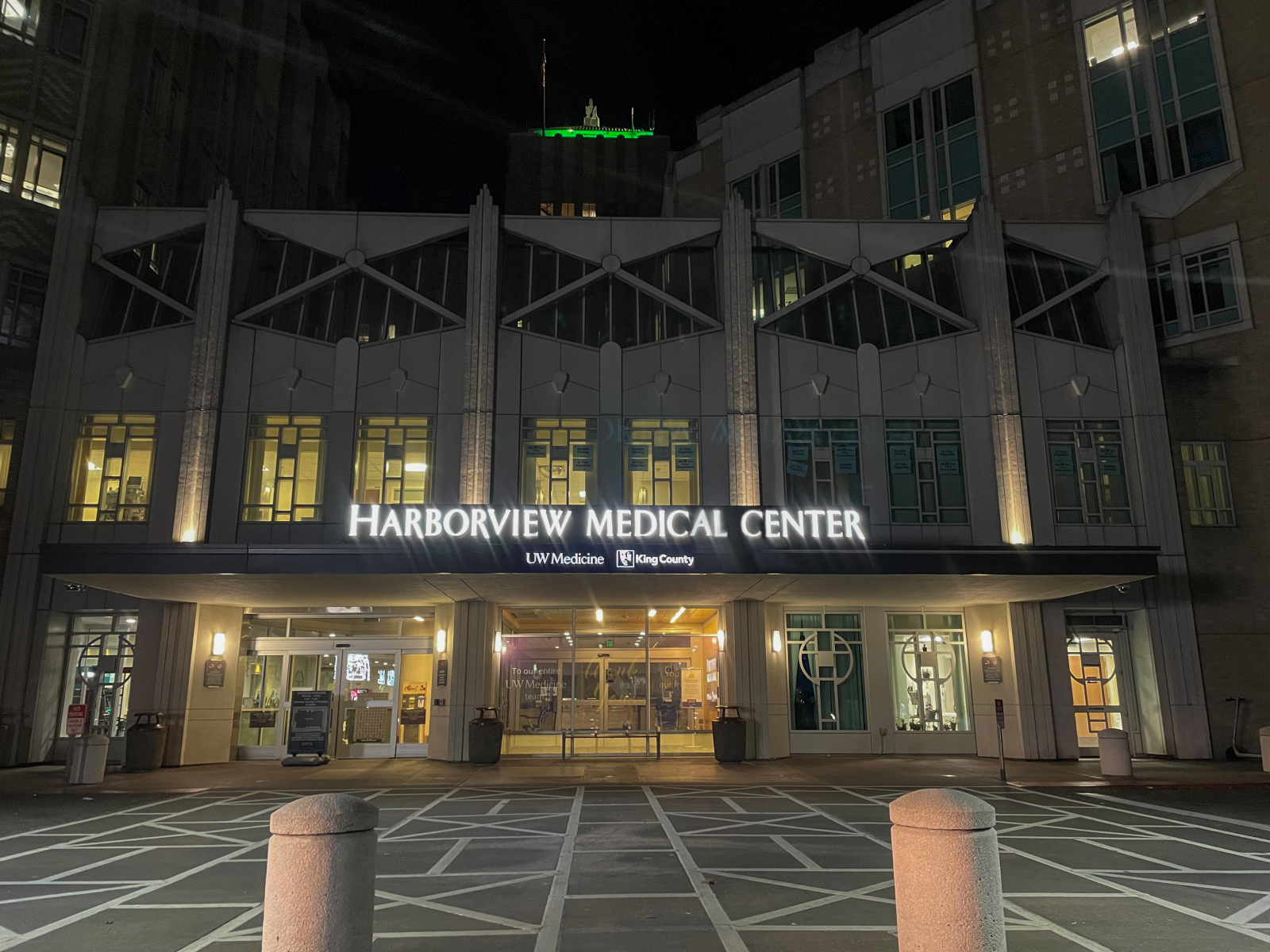 Harborview Medical Center illuminated in green in honor of National Injury Prevention Day.