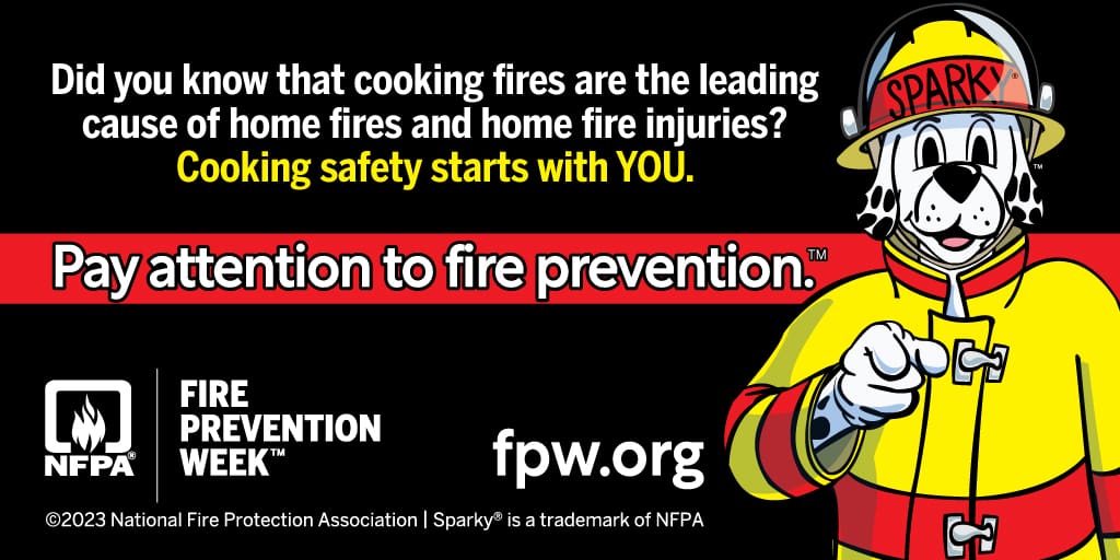 Image of Sparky the Dog pointing its finger and saying "PAY ATTENTION TO FIRE PREVENTION"